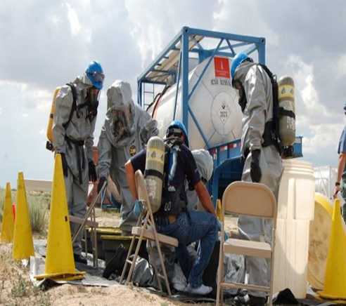 Hazmat team training to repair tank leak
